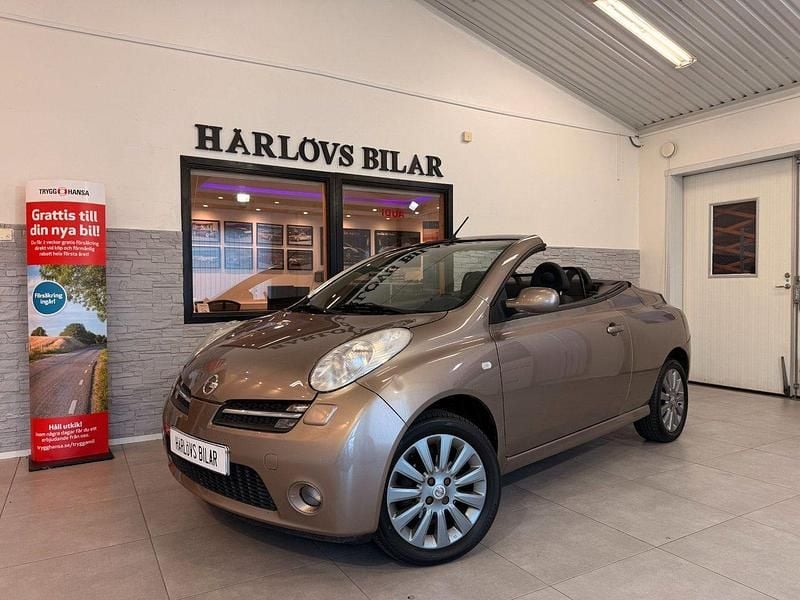 Ljusbrun (brun) Begagnad 2007 Nissan Micra C+C Cab | 48 000 kr (Marknadspris) - Bild 1/4