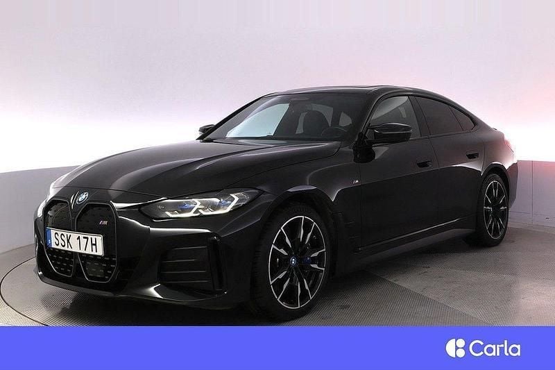 Svart Begagnad 2022 BMW i4 M Sport Sedan | 534 900 kr (Marknadspris) - Bild 1/4