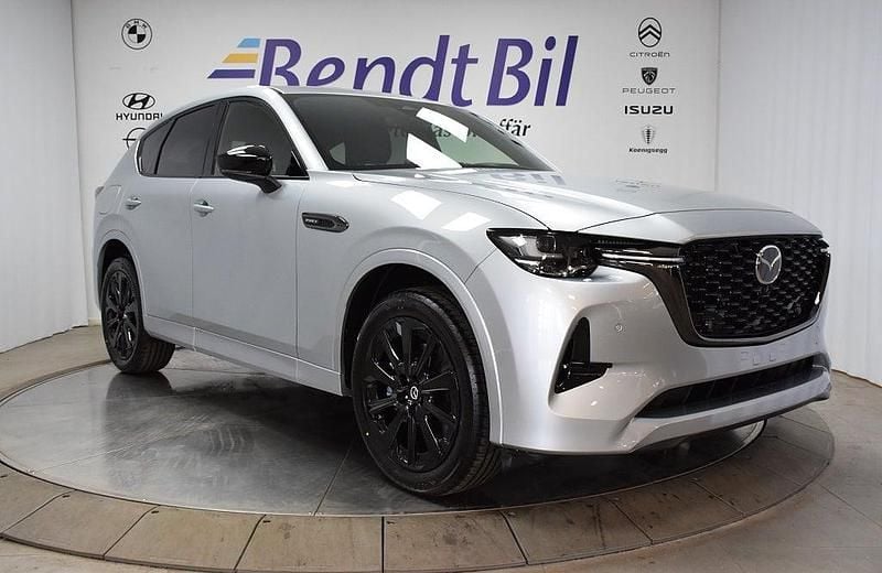 Grå Begagnad 2025 Mazda CX-60 Homura-Line SUV | 544 500 kr (Bra pris) - Bild 1/2