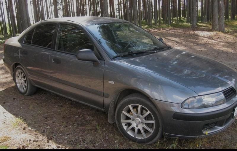 Grå Begagnad 2003 Mitsubishi Carisma Halvkombi | 17 000 kr - Bild 1/1