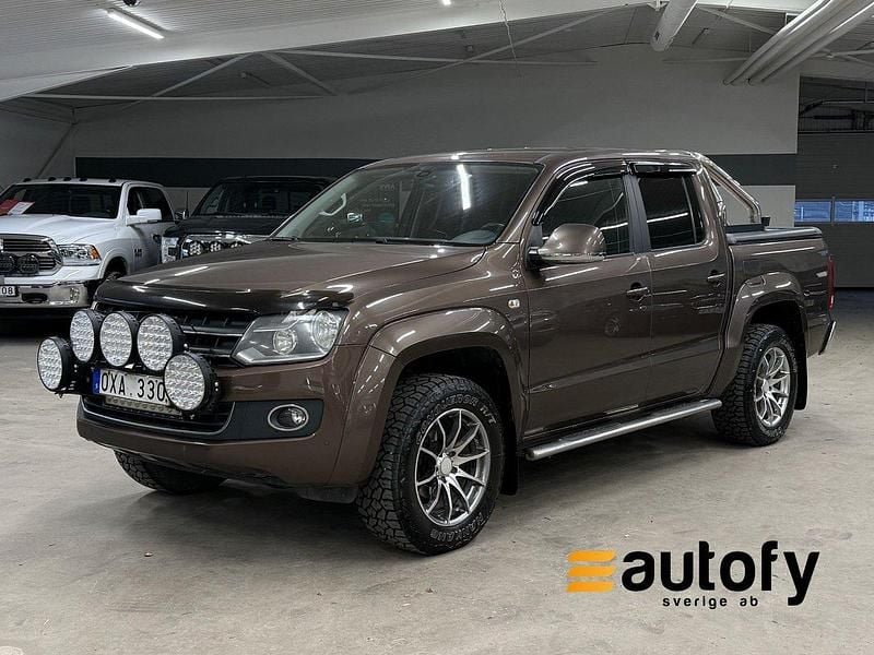 Ljusbrun (brun) Begagnad 2013 VW Amarok Highline Pickup | 169 800 kr (Marknadspris) - Bild 1/4