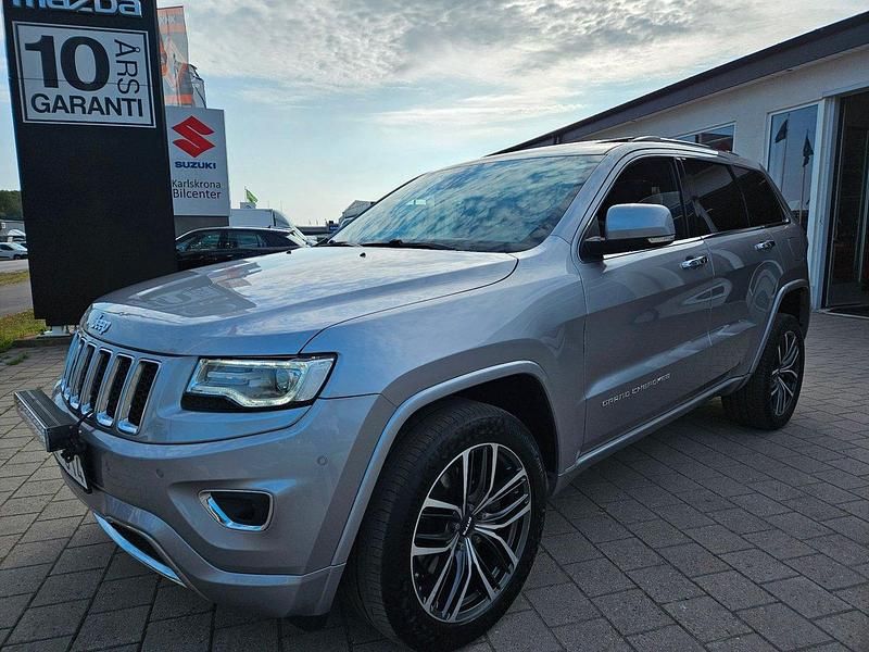 Grå (grå metallic) Begagnad 2014 Jeep Grand Cherokee Overland SUV | 219 000 kr (Lite dyr) - Bild 1/4