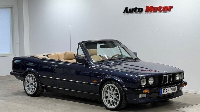 Mörkblå Begagnad 1988 BMW 325 Cabriolet Cab | 269 900 kr - Bild 1/4