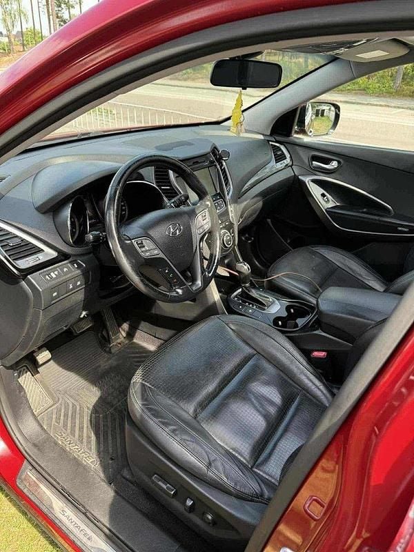 Röd Begagnad 2013 Hyundai Santa Fe Premium SUV | 123 000 kr (Marknadspris) - Bild 1/4