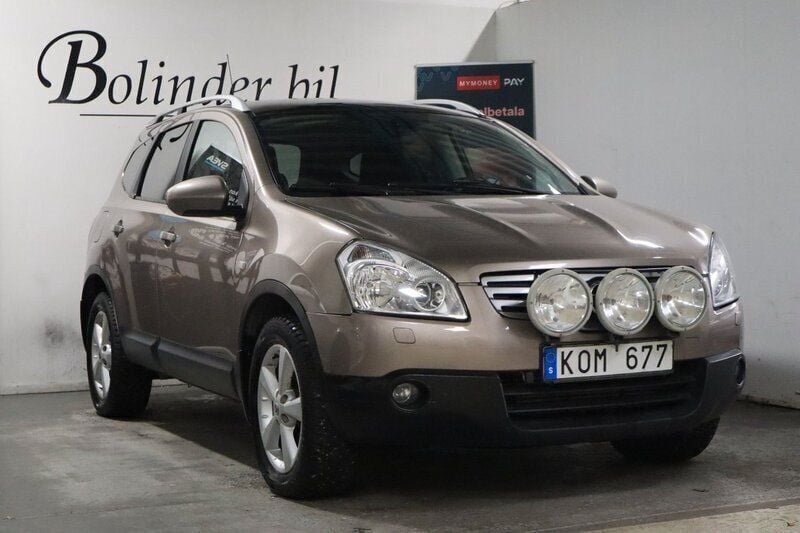 Ljusbrun Begagnad 2009 Nissan Qashqai +2 SUV | 68 900 kr (Marknadspris) - Bild 1/4