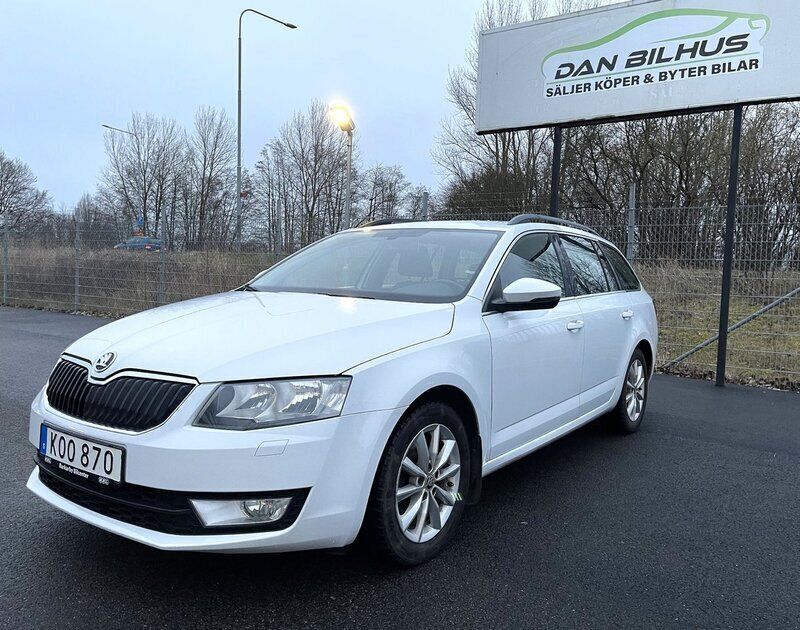 Vit Begagnad 2014 Skoda Octavia Ambition Kombi | 94 900 kr (Marknadspris) - Bild 1/4
