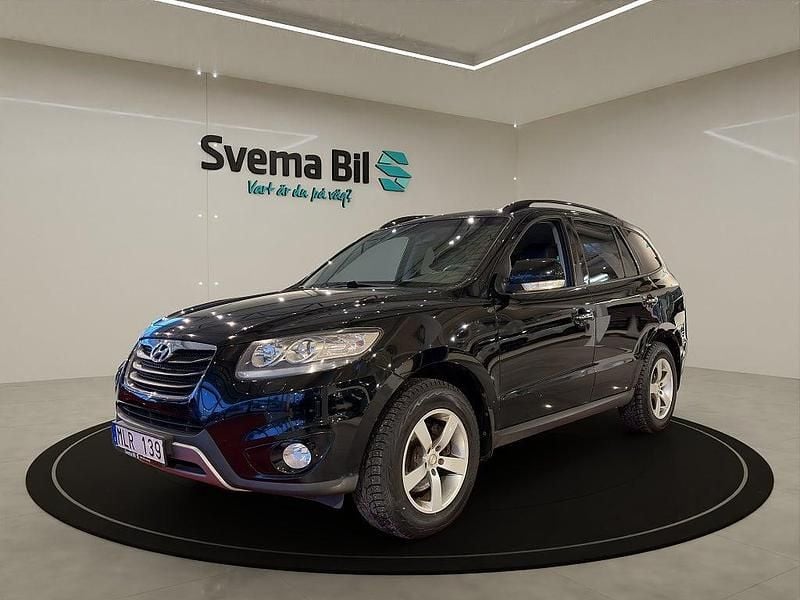 Svartmetallic Begagnad 2012 Hyundai Santa Fe Premium SUV | 114 900 kr (Dyr) - Bild 1/4