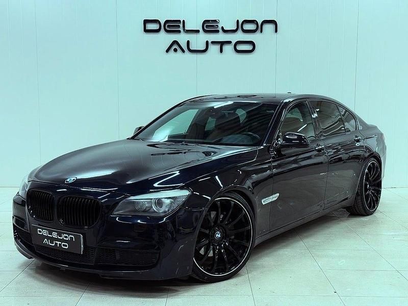 Carbonsvart metallic Begagnad 2012 BMW 740 M Sport Sedan | 229 900 kr - Bild 1/4