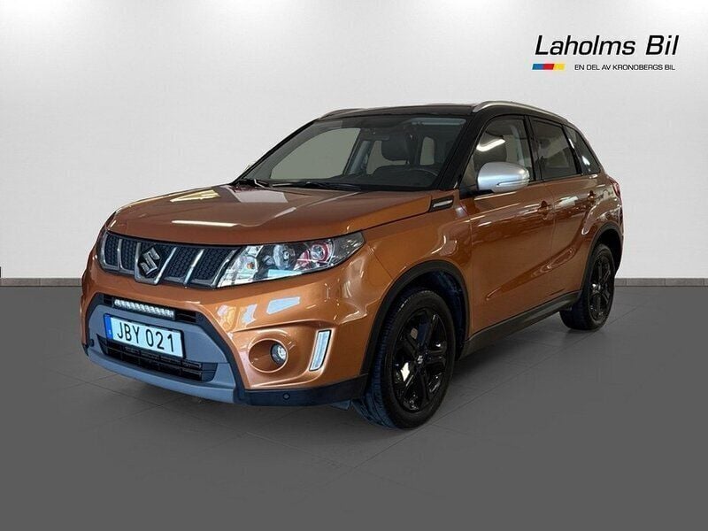 Horizon orange & black Begagnad 2016 Suzuki Vitara SUV | 158 900 kr (Marknadspris) - Bild 1/4