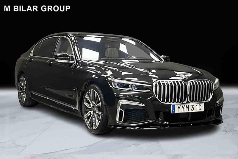 Svart Begagnad 2021 BMW 745e Sedan | 699 000 kr - Bild 1/1