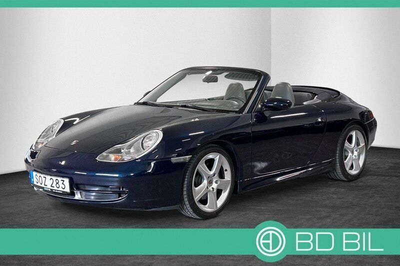 Mörkblå (blåmetallic ) Begagnad 1999 Porsche 911 Carrera Cabriolet Cab | 369 900 kr - Bild 1/2