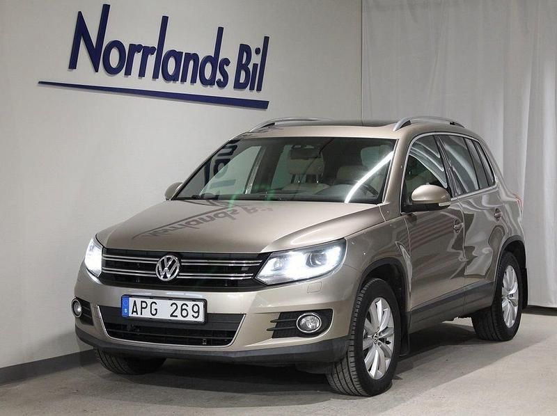 Ljusbrun (titanium beige metallic) Begagnad 2014 VW Tiguan SUV | 144 900 kr (Marknadspris) - Bild 1/4