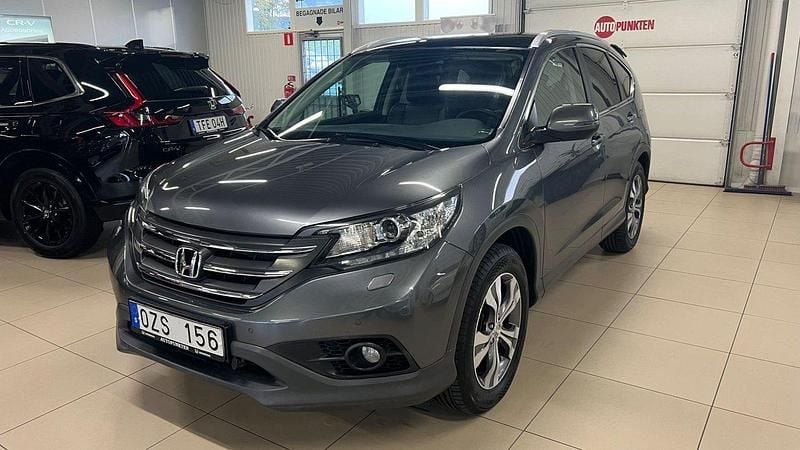 Ljusgrå Begagnad 2013 Honda CR-V Executive SUV | 154 900 kr (Lite dyr) - Bild 1/4