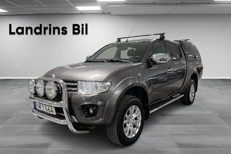 Brun (brun metallic) Begagnad 2014 Mitsubishi L200 Pickup | 174 875 kr (Marknadspris) - Bild 1/4