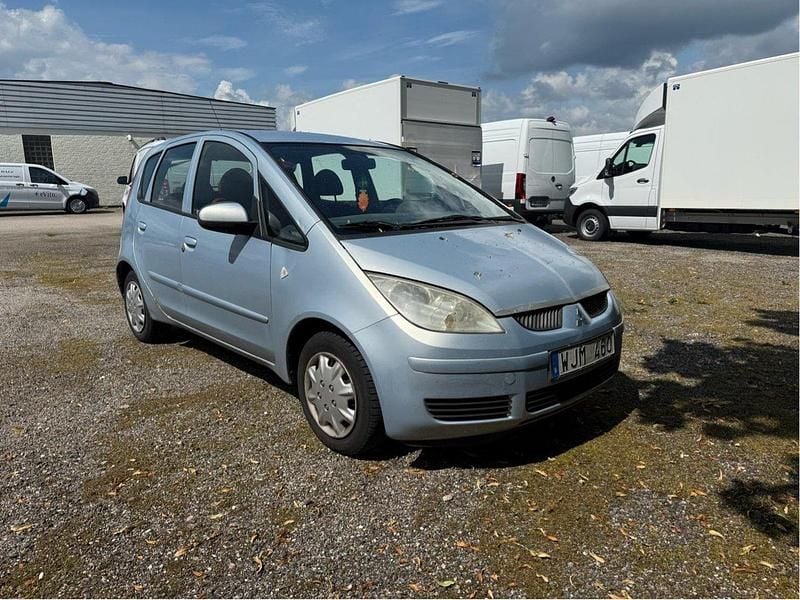 Blå Begagnad 2005 Mitsubishi Colt Halvkombi | 11 490 kr (Marknadspris) - Bild 1/4