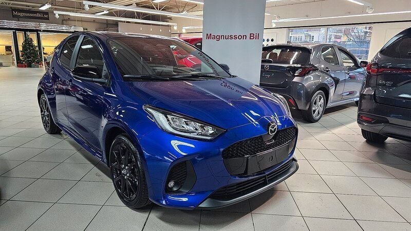Blå Ny 2024 Mazda 2 Homura-Line Halvkombi | 303 400 kr (Bra pris) - Bild 1/3