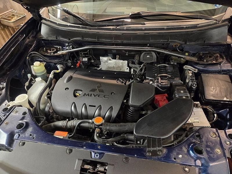 Begagnad Mitsubishi Outlander 170 HK (125 kW) 2010 Blå SUV