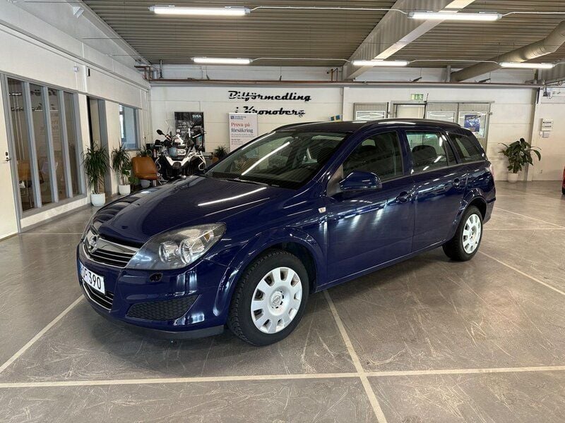 Blå Begagnad 2011 Opel Astra Kombi | 49 900 kr (Marknadspris) - Bild 1/4