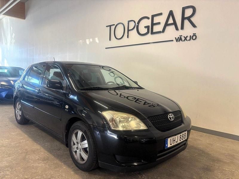 Svart Begagnad 2003 Toyota Corolla Halvkombi | 27 900 kr (Marknadspris) - Bild 1/4