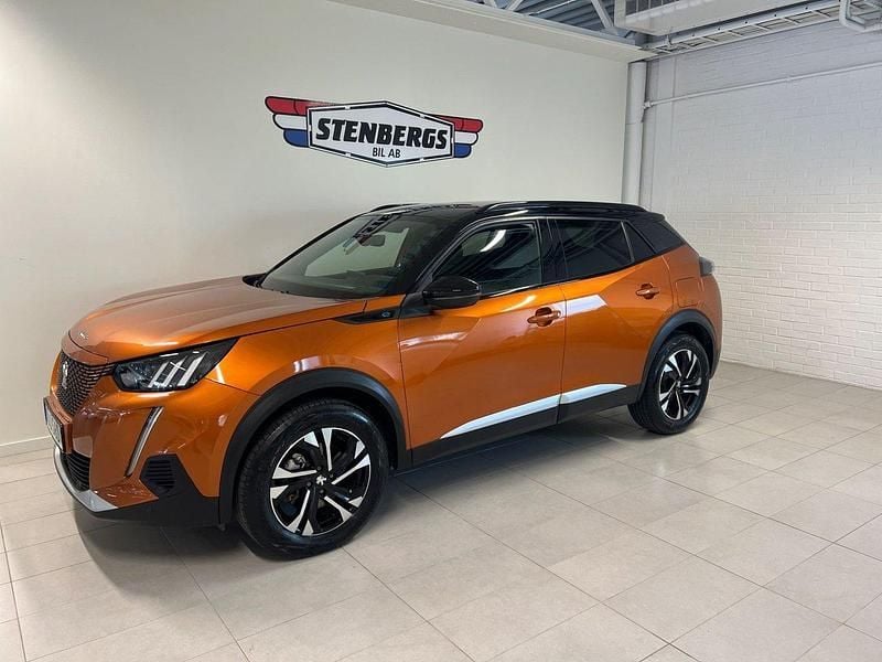 Orange (orange met) Begagnad 2022 Peugeot e-2008 GT SUV | 289 900 kr - Bild 1/4