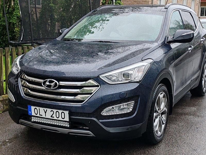 Blå Begagnad 2014 Hyundai Santa Fe SUV | 125 000 kr (Marknadspris) - Bild 1/4