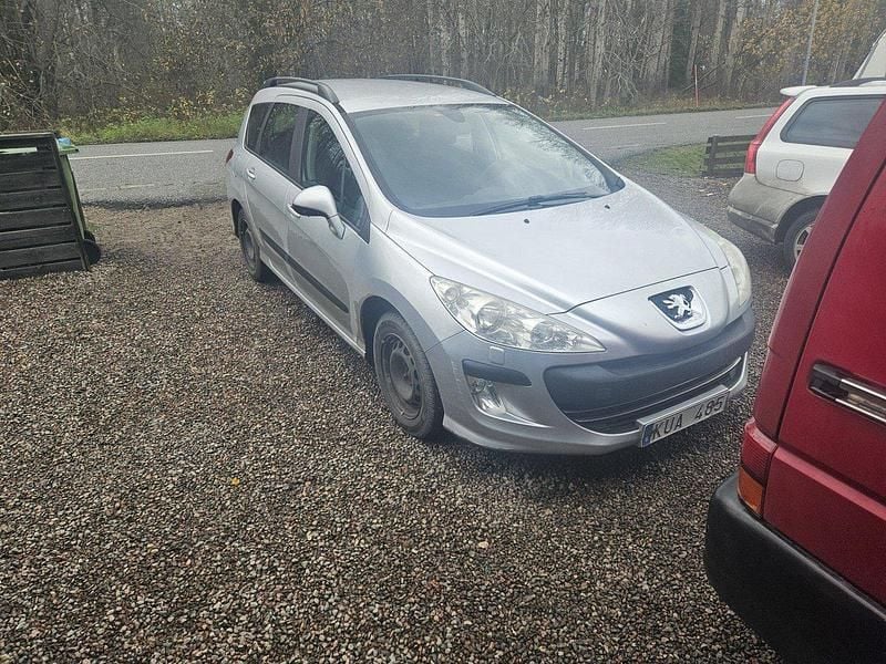 Grå Begagnad 2010 Peugeot 308 Kombi | 25 000 kr (Marknadspris) - Bild 1/4