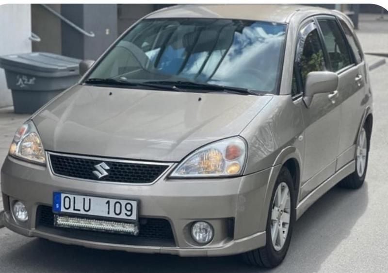 Brun Begagnad 2007 Suzuki Liana Halvkombi | 22 000 kr (Marknadspris) - Bild 1/1