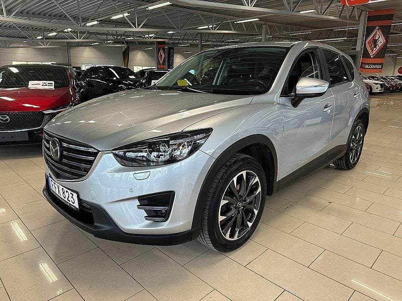 Grå Begagnad 2015 Mazda CX-5 Optimum SUV | 179 000 kr (Marknadspris) - Bild 1/4
