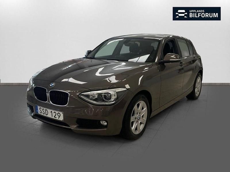 Brun Begagnad 2013 BMW 116 Halvkombi | 89 000 kr (Marknadspris) - Bild 1/4