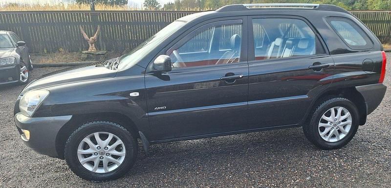 Svart Begagnad 2007 Kia Sportage 4 SUV | 35 000 kr (Marknadspris) - Bild 1/4