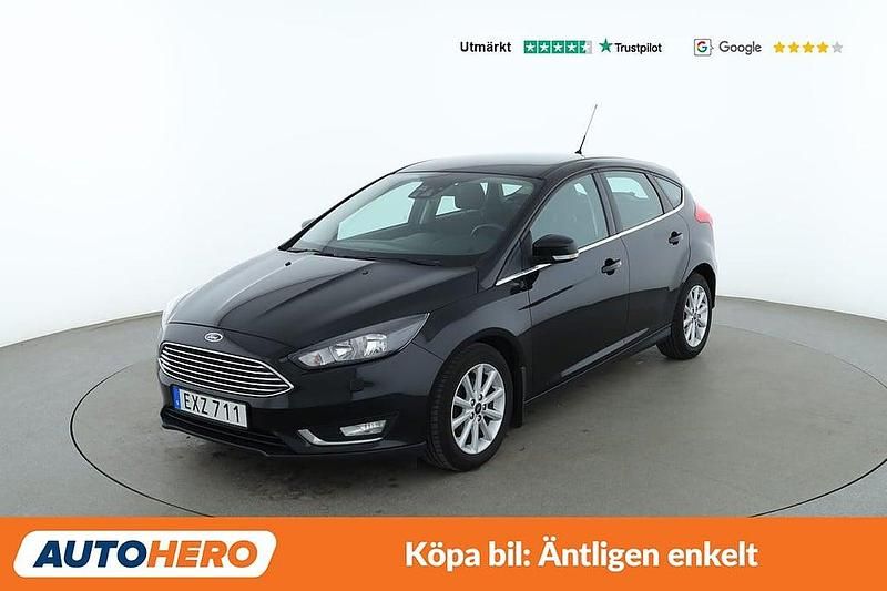 Svart Begagnad 2015 Ford Focus Titanium Halvkombi | 81 000 kr (Marknadspris) - Bild 1/4