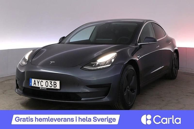 Grå Begagnad 2019 Tesla Model 3 Standard Range Plus Sedan | 219 990 kr (Bra pris) - Bild 1/4