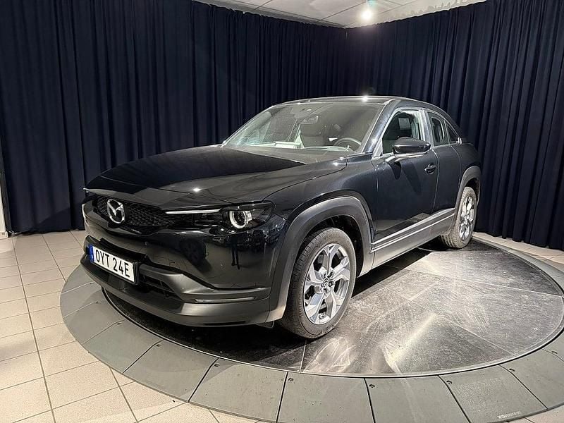 Svart metallic Begagnad 2021 Mazda MX30 SUV | 149 000 kr (Marknadspris) - Bild 1/4