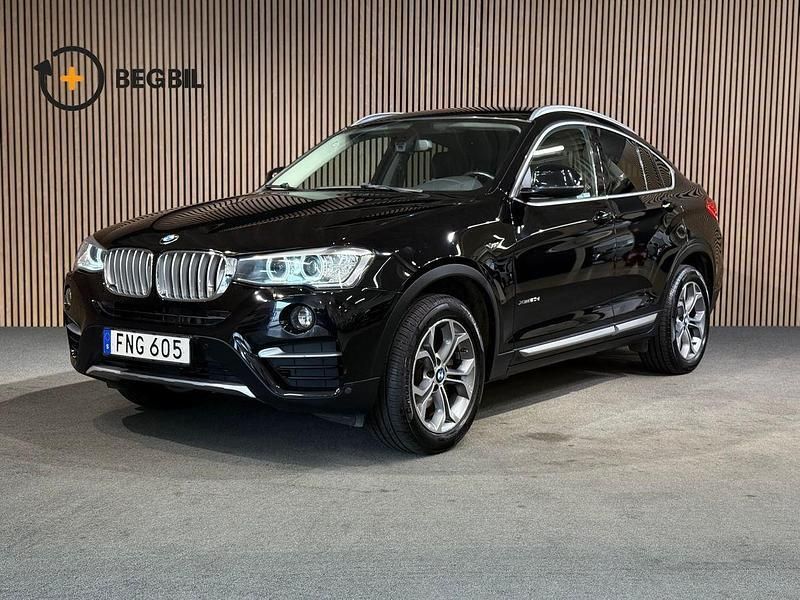 Svart Begagnad 2015 BMW X4 xLine SUV | 214 900 kr (Marknadspris) - Bild 1/4