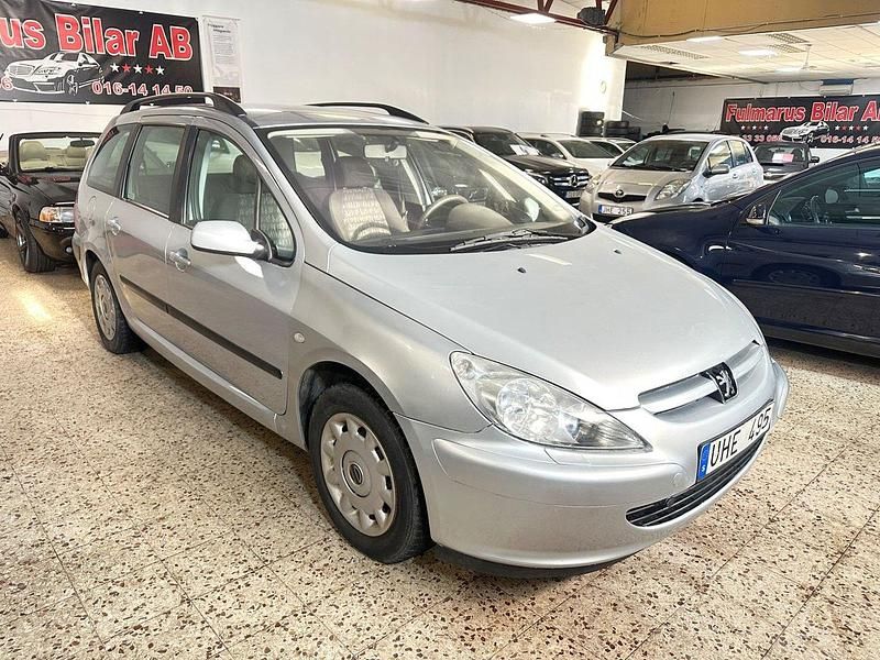 Ljusgrå Begagnad 2003 Peugeot 307 Kombi | 32 900 kr (Marknadspris) - Bild 1/4