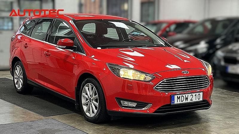 Begagnad Ford Focus Titanium 125 HK (91 kW) 2015 Röd Kombi