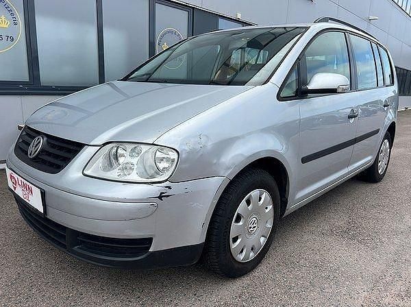 Mörkblå (silver) Begagnad 2004 VW Touran Minibuss | 17 999 kr - Bild 1/4
