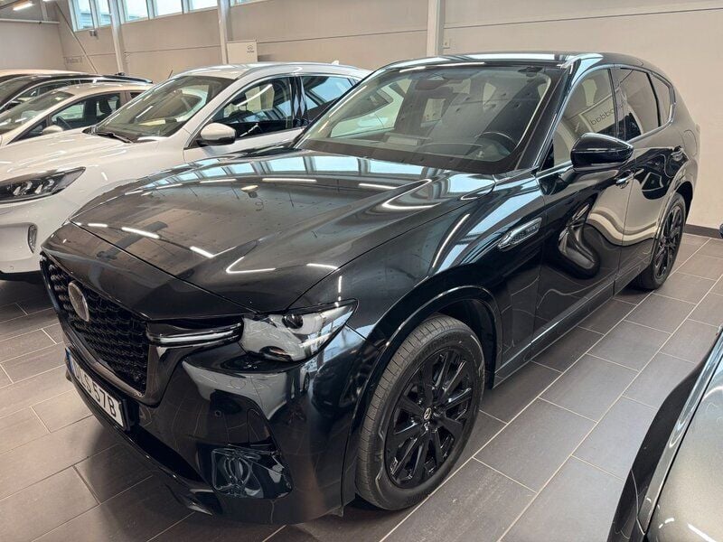 Svart (jet black) Begagnad 2023 Mazda CX-60 Homura-Line SUV | 449 000 kr (Marknadspris) - Bild 1/4