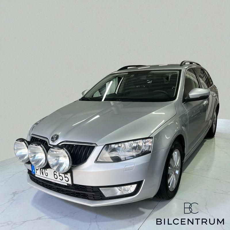 Silver Begagnad 2014 Skoda Octavia Kombi | 79 900 kr (Marknadspris) - Bild 1/4