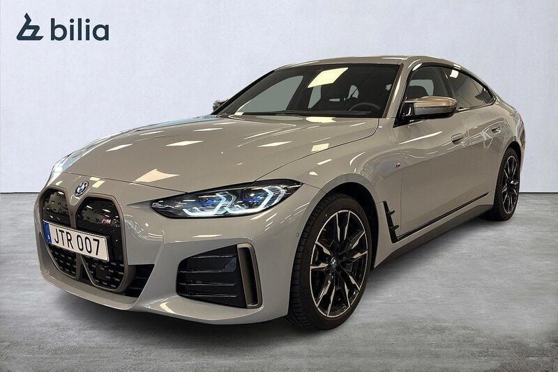 Grå (brooklyn grå metallic) Begagnad 2023 BMW i4 M Sport Sedan | 599 000 kr (Superpris) - Bild 1/4