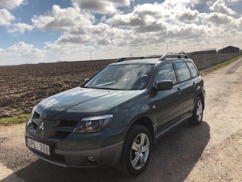 Mörkgrön Begagnad 2003 Mitsubishi Outlander SUV | 34 500 kr (Marknadspris) - Bild 1/4