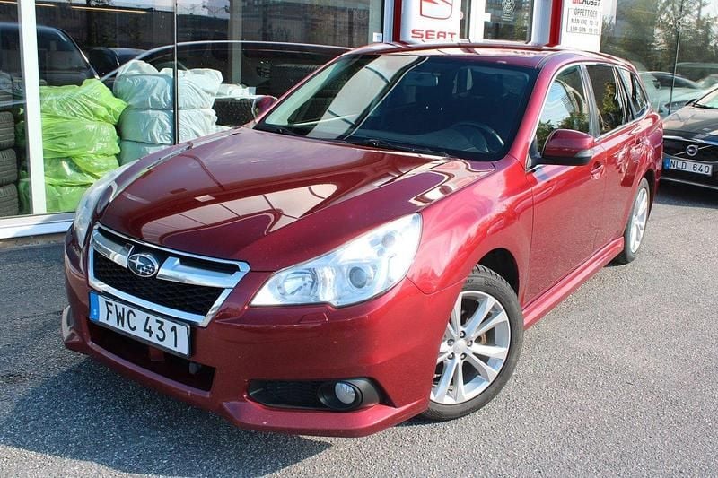 Ljusröd (röd) Begagnad 2014 Subaru Legacy Kombi | 99 900 kr (Bra pris) - Bild 1/4