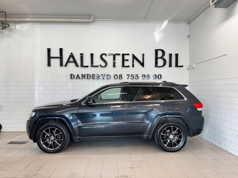 Blå Begagnad 2013 Jeep Grand Cherokee Overland SUV | 139 000 kr - Bild 1/4