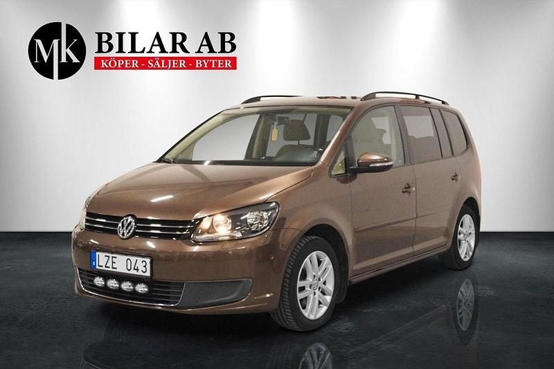 Brun Begagnad 2011 VW Touran Minibuss | 119 900 kr (Lite dyr) - Bild 1/4