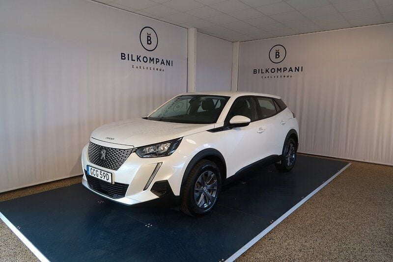 Vit Begagnad 2021 Peugeot e-2008 SUV | 159 800 kr (Marknadspris) - Bild 1/4