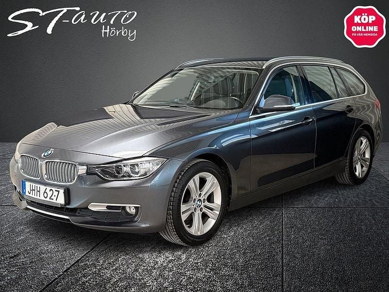 Grå Begagnad 2014 BMW 318 Sport Line Kombi | 119 900 kr (Marknadspris) - Bild 1/4
