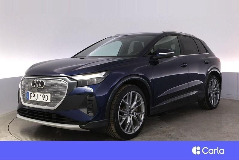 Blå Begagnad 2024 Audi Q4 e-tron Sport SUV | 575 900 kr (Marknadspris) - Bild 1/4