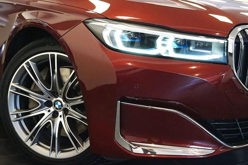 Begagnad BMW 745 Comfort Edition 394 HK (289 kW) 2021 Röd Sedan