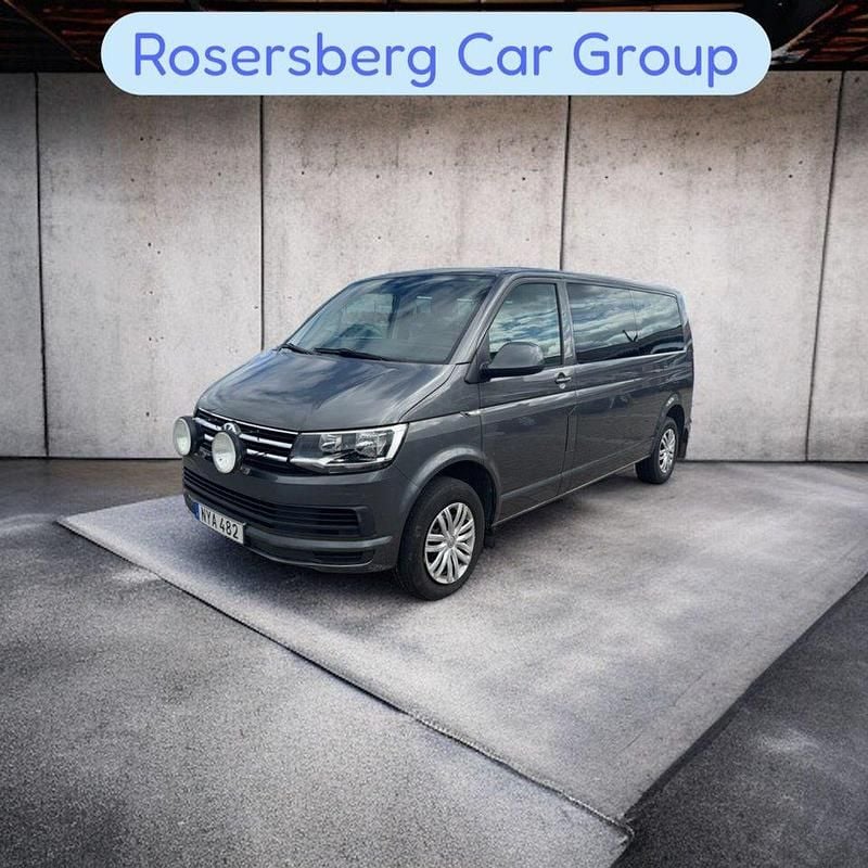 Grå Begagnad 2015 VW Caravelle Comfortline Minibuss | 339 875 kr - Bild 1/4