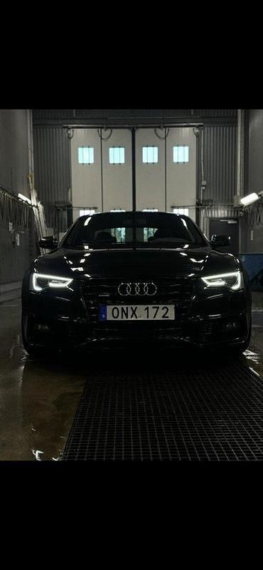 Svart Begagnad 2014 Audi A5 S-Line Sportkupé | 140 000 kr (Marknadspris) - Bild 1/4